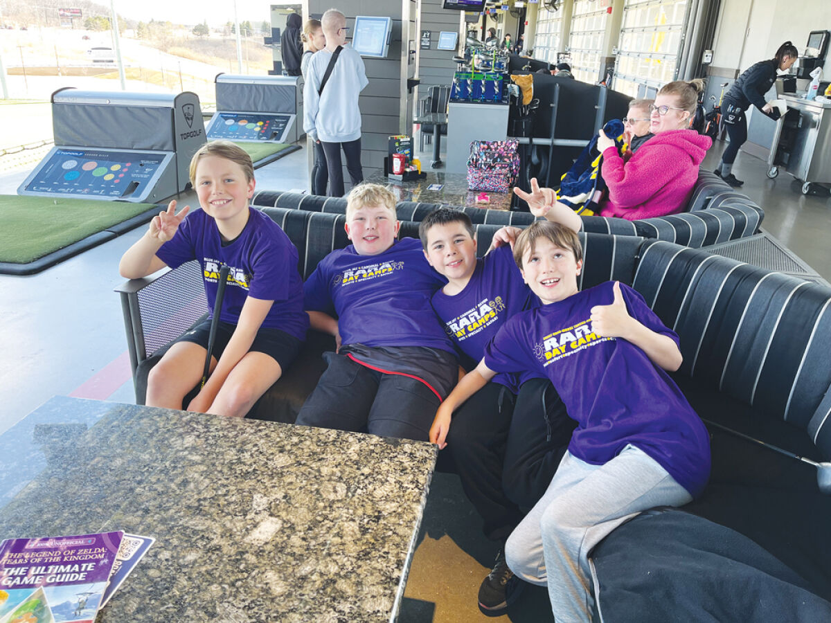  A group of kids pose for a photo at TopGolf during a Rochester Avon Recreation Authority camp. 