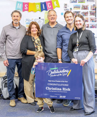  Christina Rick celebrates her award with family members, including her in-laws Mike and Yvette Metz, her father Jeff Rick, her husband Mike Metz, and their 4-year-old son Oscar Rick-Metz. 