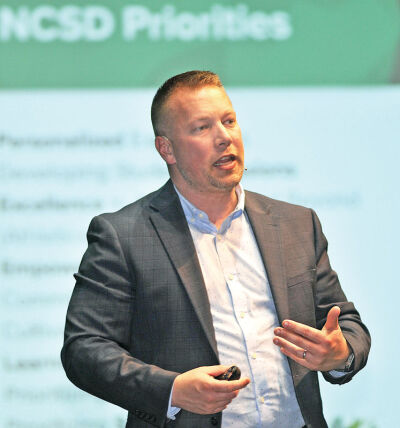  Ben Mainka, superintendent of the Novi Community School District, gives his annual State of the District address Feb. 25 at Novi High School. 