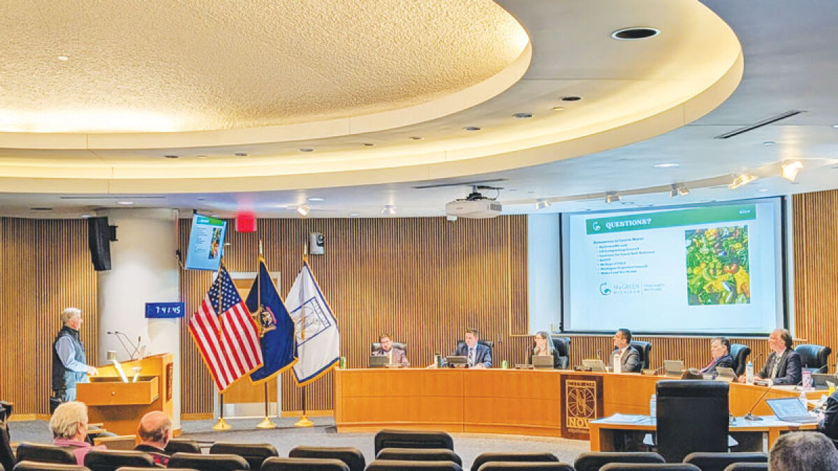  Robb Harper, director of operations at My Green Michigan, fields questions from the Novi City Council on recycling food waste during its regular meeting March 23. 