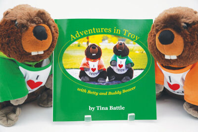  Betty and Buddy Beaver, the titular stars of Tina Battle’s “Adventures in Troy with Betty and Buddy Beaver,” serve as guides to destinations around Troy in the new children’s book.  