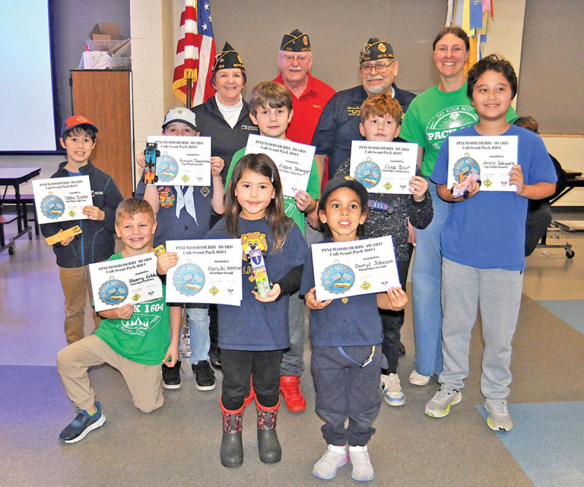  The winners of the Cub Scouts Pack 1604 Pinewood Derby pose for a photo with their sponsors, Kris Caryl, commander of American Legion Post 253 (back row, left), and Ed Burkhardt and John Williams, also from American Legion Post 253. Joining the group is Scoutmaster Jessica Gibbs. The Scouts range from kindergarten through fifth grade. 