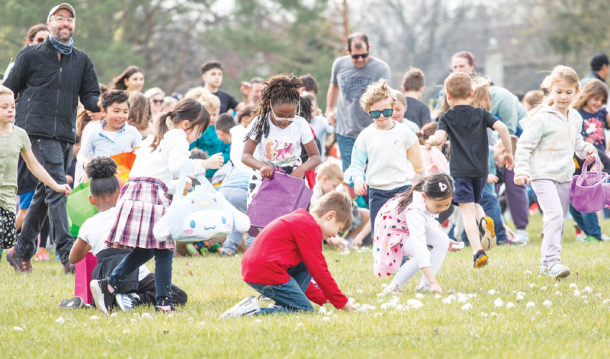  Kids race to pick up marshmallows during a previous event. 
