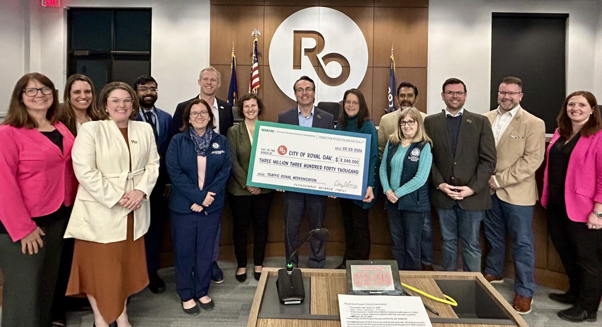  Royal Oak Mayor Michael Fournier and city commissioners are joined by City Engineer Holly Donoghue; Amy O’Leary, of SEMCOG; state Rep. Natalie Price; state Rep. Sharon MacDonell; and Akashi Kolluri, regional manager for U.S. Sen. Elissa Slotkin. 