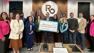  Royal Oak Mayor Michael Fournier and city commissioners are joined by City Engineer Holly Donoghue; Amy O&rsquo;Leary, of SEMCOG; state Rep. Natalie Price; state Rep. Sharon MacDonell; and Akashi Kolluri, regional manager for U.S. Sen. Elissa Slotkin. 