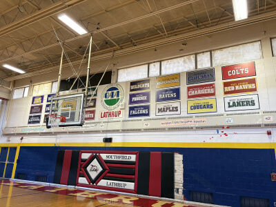  The University K-12 Academy gymnasium on March 28 shows that parts of the building still have logos from when it was Southfield Lathrup High School. 