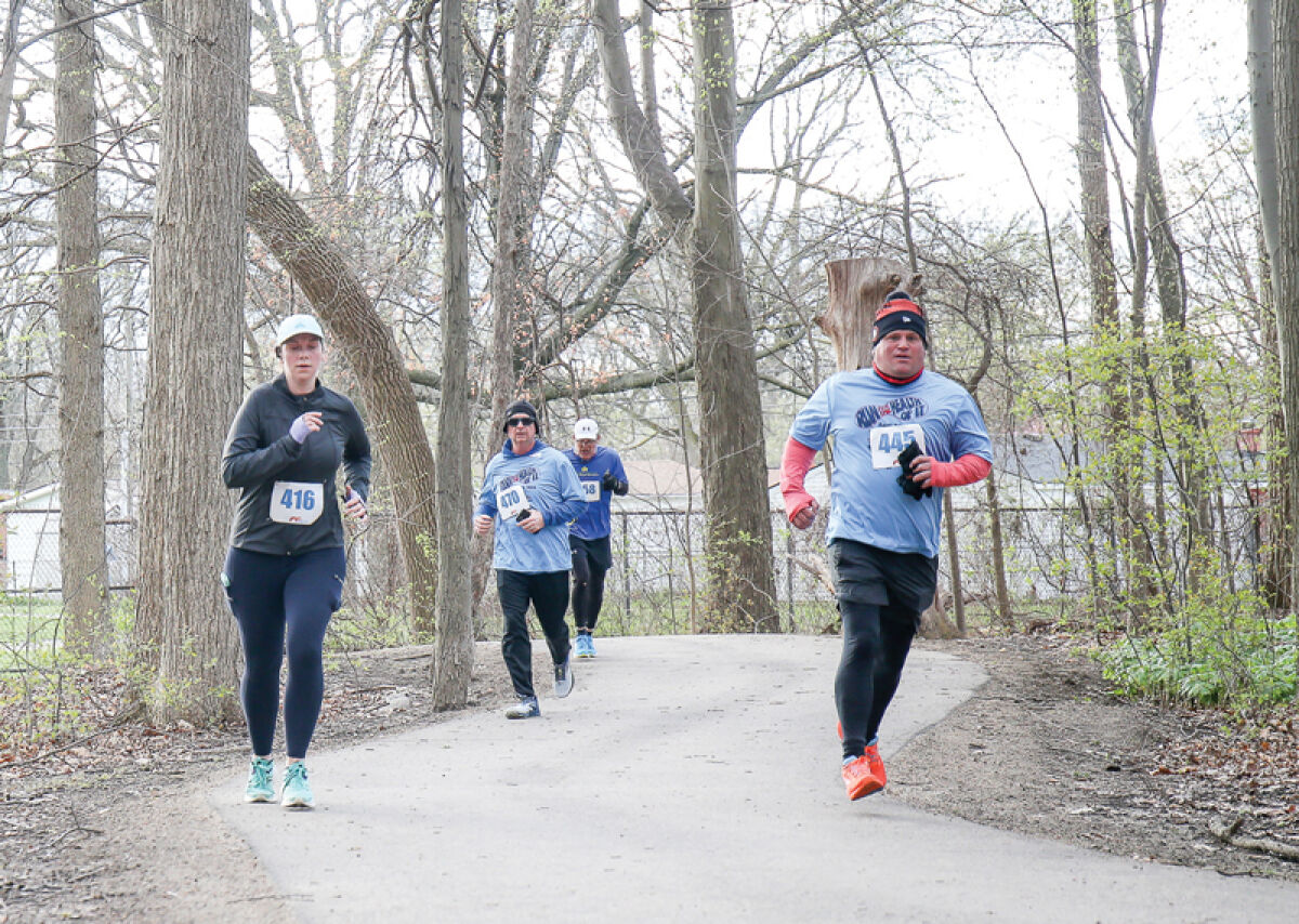  Runners reach the finish line at the Red Oaks Nature Center in these photos from the “Run for the Health of It” 5K Run/Walk in 2024. This year’s event will be April 25. 
