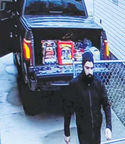  In these images secured by the FBI, the suspect is reportedly seen filling containers of gasoline a few days before the attack, stashing them in the same truck he drove into the building. 