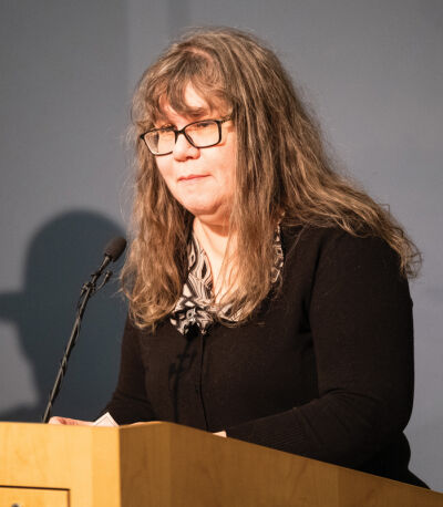  Warren Police Department office coordinator Jill Finch delivers remarks after receiving the Civilian Employee of the Year award. 