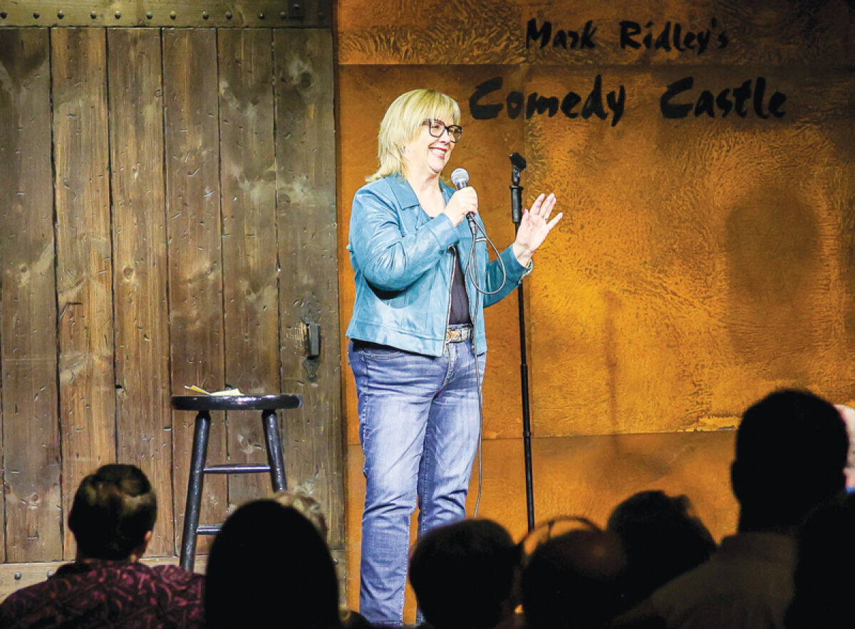  Diane Young, 61, of Warren, performed onstage at Mark Ridley’s Comedy Castle in Royal Oak in March. 