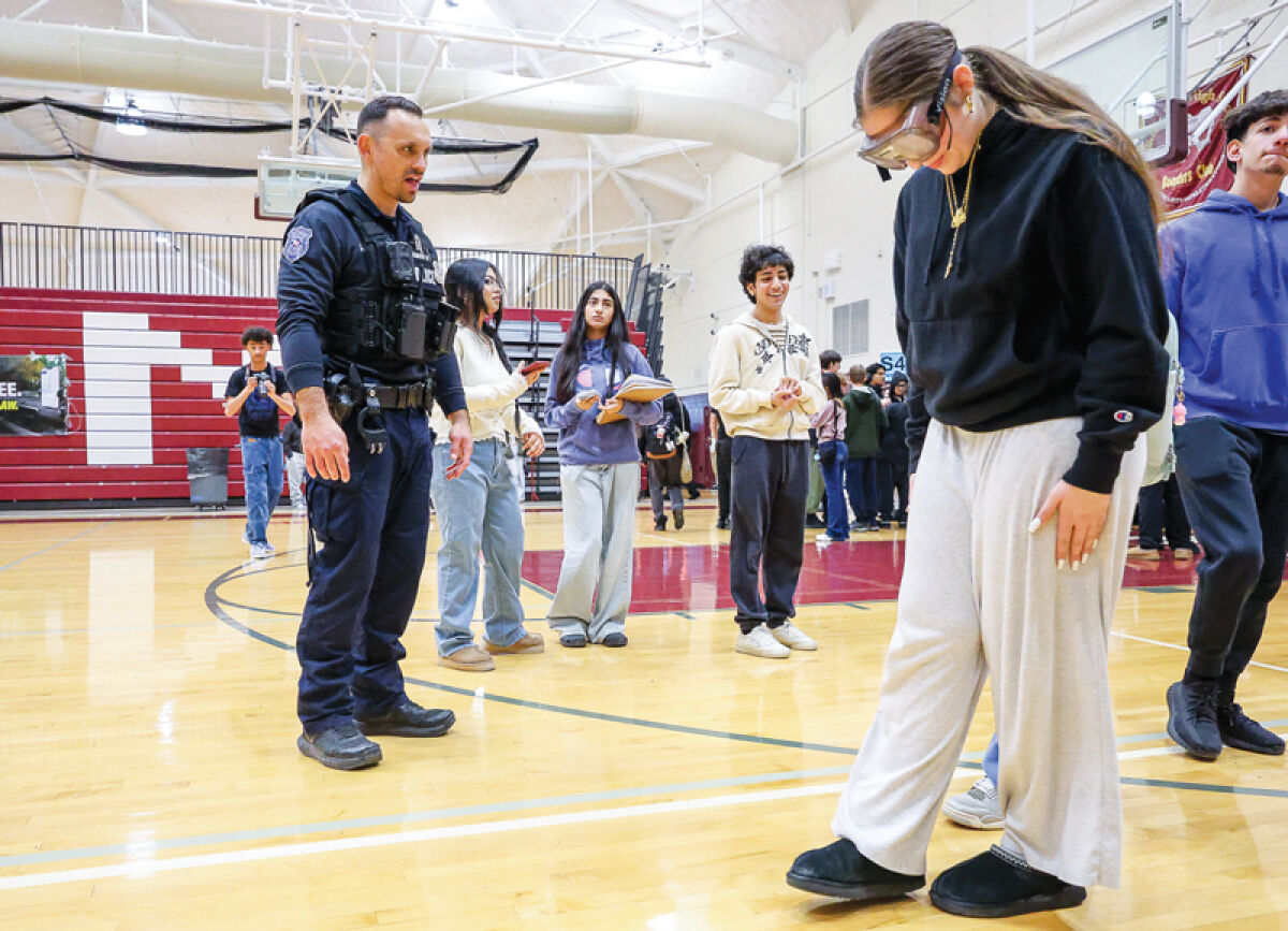  On March 19, Warren Mott High School hosted the annual “Strive for a Better Drive” safety event. Warren Police Department officers had students walk the line during a simulated road sobriety test while wearing goggles that simulated being under the influence of alcohol.  