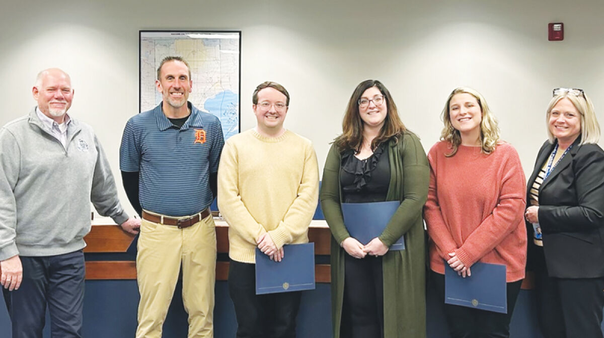  The 2026 Warren Woods Public Schools teachers of the year were recognized at the district’s March 23 Board of Education meeting. From left to right: Warren Woods Public Schools Board of Education President Michael Schulte; Warren Woods Tower High School English teacher Steve Zdankiewicz; Warren Woods Middle School seventh grade science teacher Jimmy Miracle; Pinewood Elementary School third grade teacher Kayla Leonard; Warren Woods Early Childhood Center occupational therapist Stephanie Nottle, and district Superintendent Stacey Denewith-Fici. 