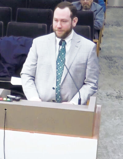  Nathan Inks, chairman of the Sterling Heights Sustainability Commission, delivers an update on the volunteer board’s work to City Council  members March 17.  