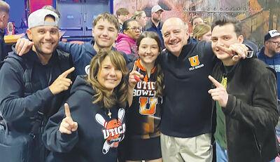  The Mazza family celebrates after Ava Mazza’s state title victory on March 2. 