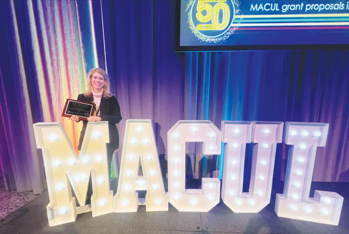  Utica High School science teacher Karyn McConachie is the recipient of the Frank Miracola 21 Things Educational Excellence award from the Michigan Association for Computer Users in Learning and the Regional Educational Media Center Association of Michigan. 