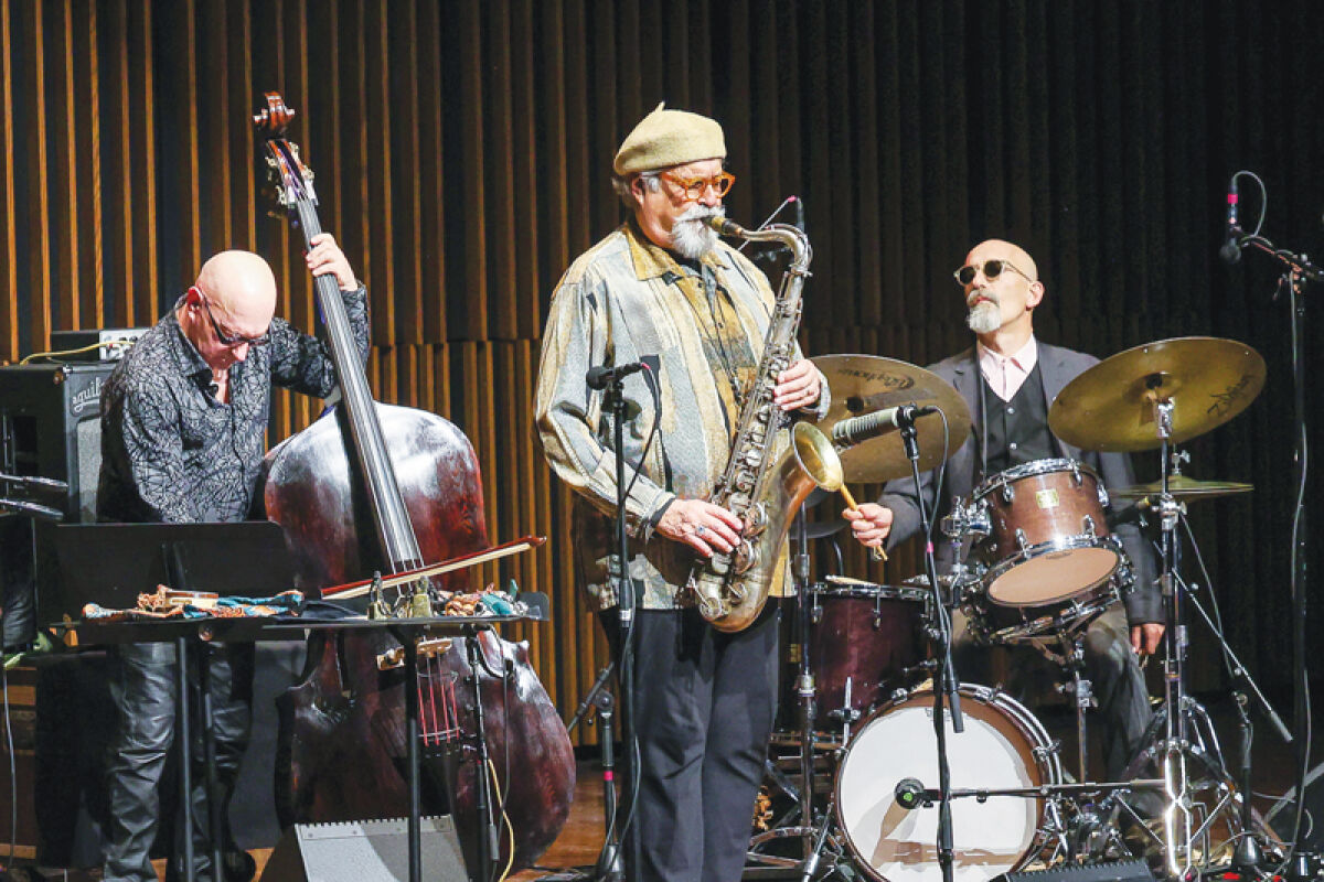  Joe Lovano, the Detroit Jazz Festival’s 2026 artist-in-residence, performs with his band, which includes bassist John Menegon and drummer Lamy Istrefi. 