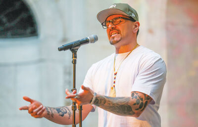  Ojibwe hip-hop artist Thomas X performs in the Rivera Court. 