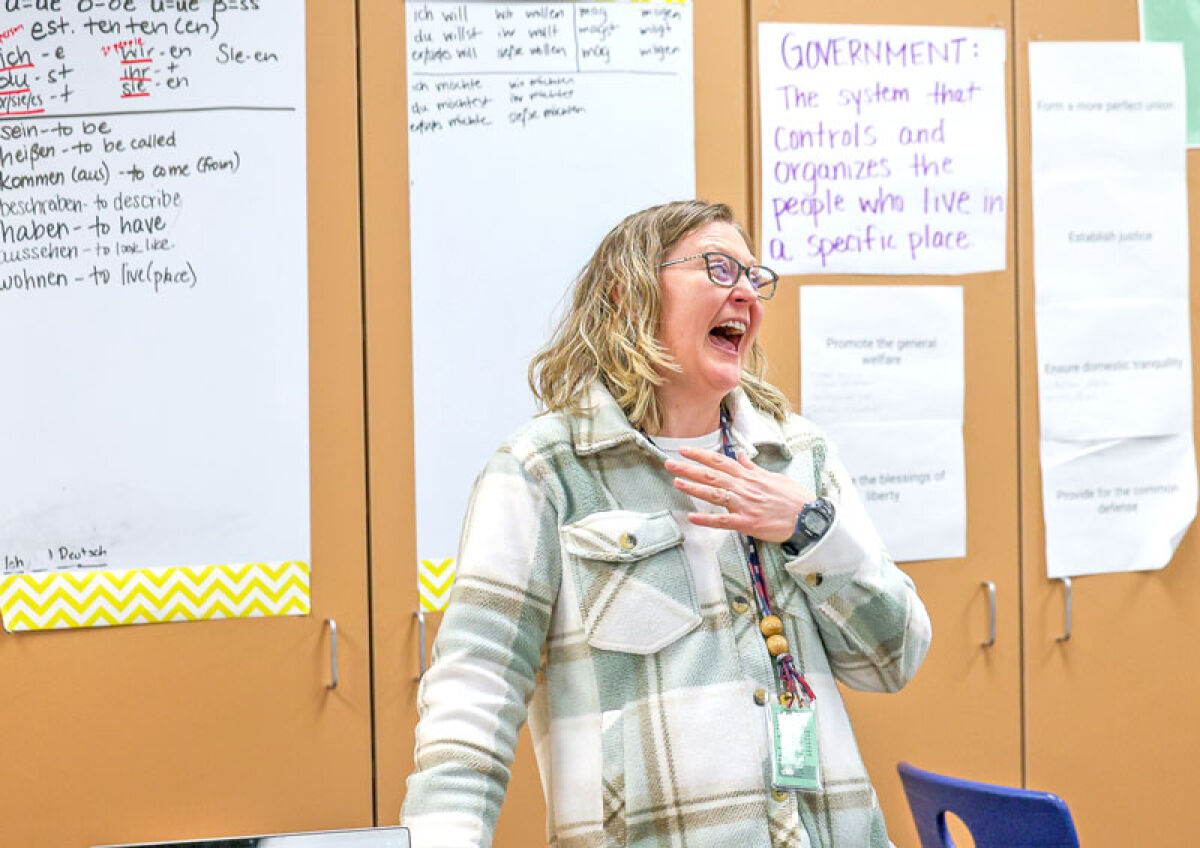  Novi Middle School German teacher Rebekah Schulze learns that she is the Novi Community School District Educator of the Year March 5. 