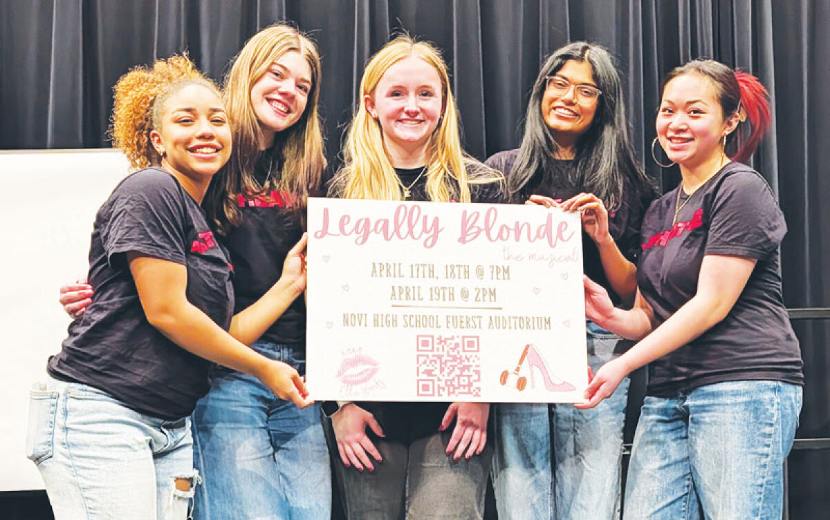  “Legally Blonde: The Musical” cast and crew members pose for a quick promotional picture.  From left are Nian Kinnard (who plays Pilar), Lorelai Raudszus (Vivienne), Esme Scott (Elle) and student directors Joanna Ambadipudi and Lilly Balino. 