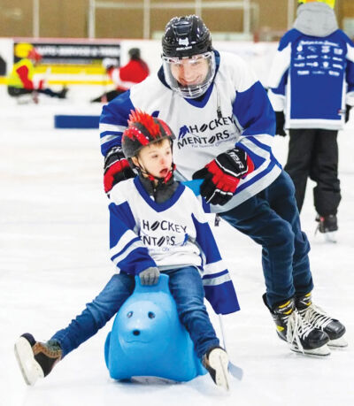  Wyatt Lucas, founder and president of Hockey Mentors, skates in an event from last year. 