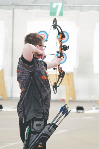  Edwin MacKenzie prepares to shoot an arrow during a competition earlier this year. 