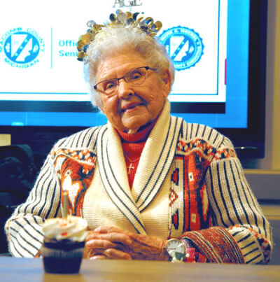  Rita Bova, 102, attends the Macomb County centenarian celebration on Oct. 25. A county resident for 50 years, Bova keeps to a routine of listening to daily mass and having a glass of red wine at 5 p.m. 