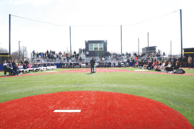  Officials, staff, students and members of the public gather April 6 for the  ribbon cutting of Stevenson High School’s new athletic complex. 