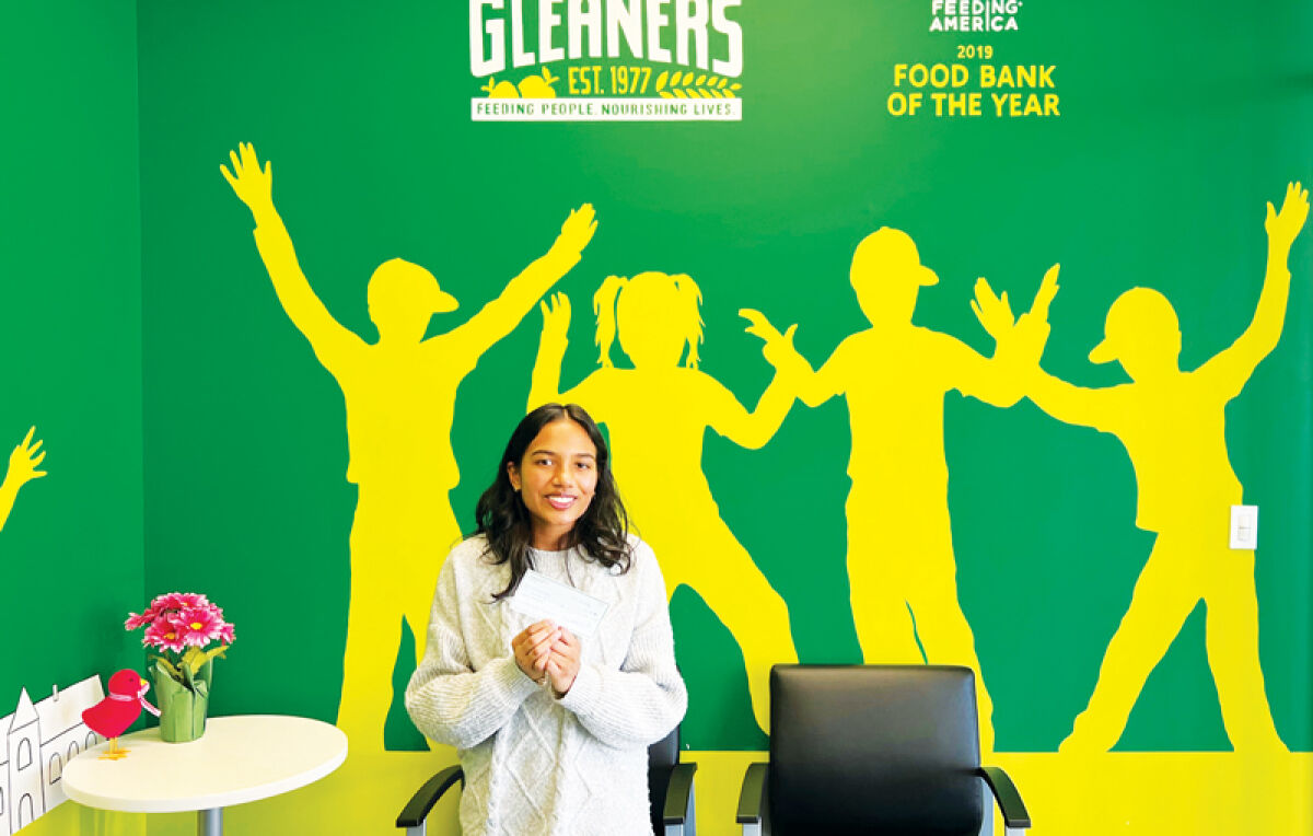  Vrinda Boopalam, pictured, and Praseeda Chellemella, both sophomores at Athens High in Troy, have been raising funds for Gleaners Food Bank by selling affordably priced meal boxes to members of the Troy community. 