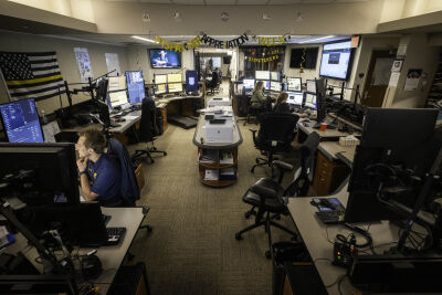  Decorations celebrating Dispatcher Appreciation Week hang around the Warren Police Department dispatch center. 