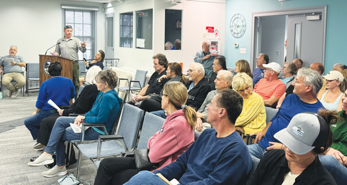  Nick Maluchnik speaks during a public hearing on April 13.  