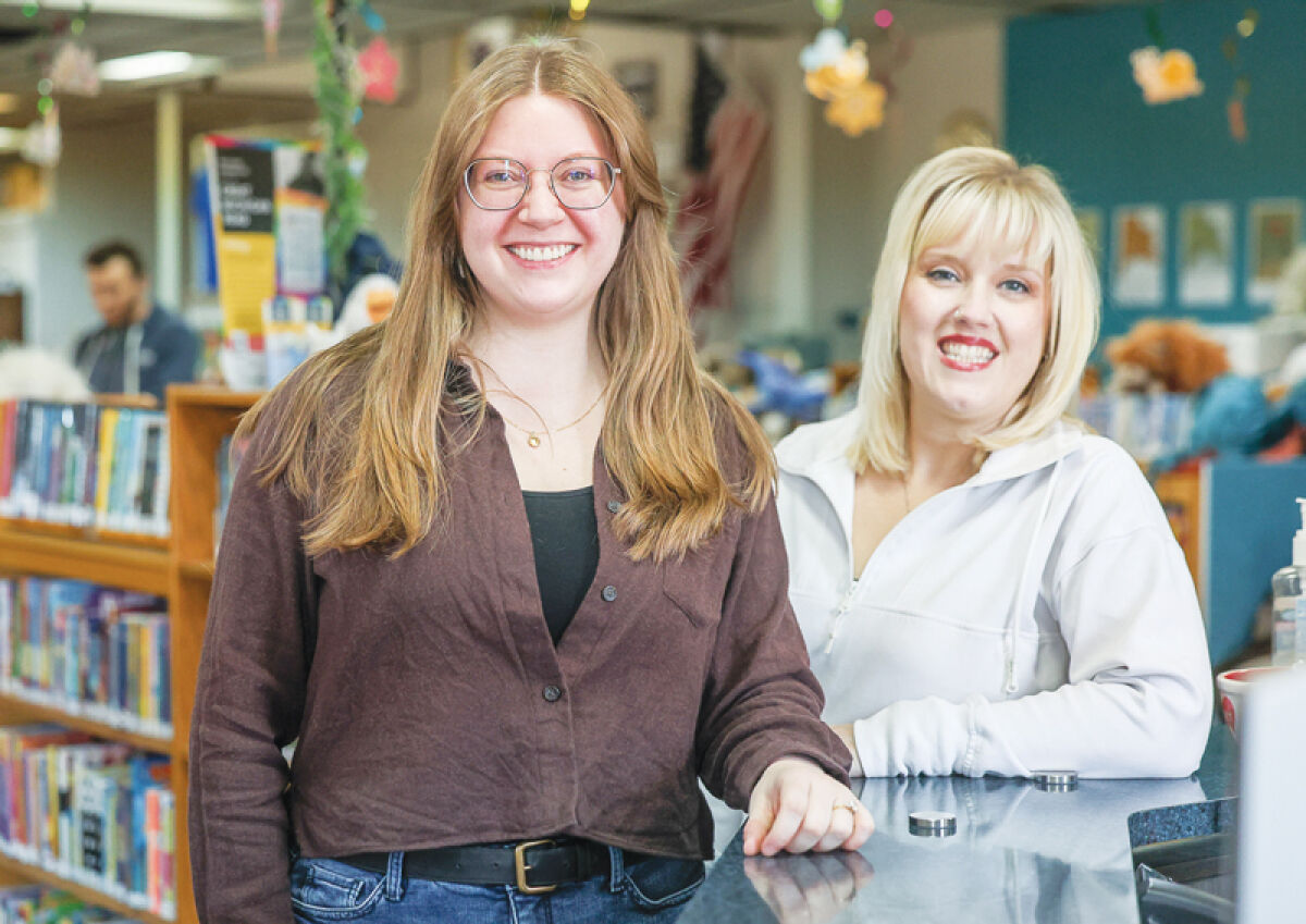 Brittany Ploep, an adult services librarian, and Tina Rossow, head of youth and teen services, are geared up for the summer reading program at the Harrison Township Public Library.  