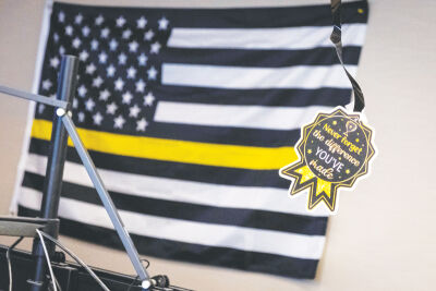  Decorations celebrating Dispatcher Appreciation Week hang around the Warren Police Department dispatch center. 