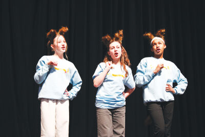  Parkway Christian Middle School students rehearse a scene from “Elephant & Piggie’s  ‘We Are in a Play!’ Jr.” From left are Leia Cannistraci of St. Clair Shores, Olivia Scally  of Macomb Township, and Megan Moore of Sterling Heights. 
