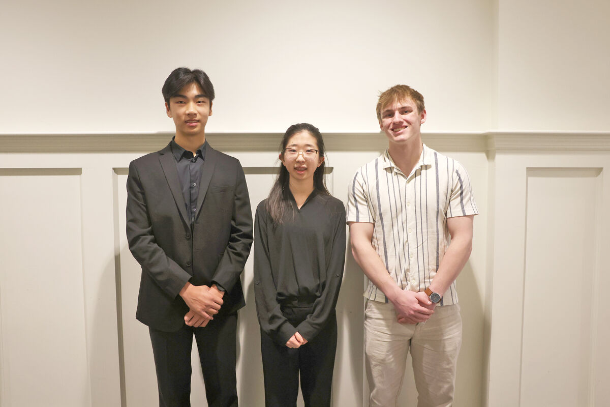  The Birmingham Concert Band gave out scholarships April 19 to, from left, Andrew Zaeng, sophomore at Detroit Country Day; Lael Lee, eighth grader at Hart Middle School; and Bradlee Coggins, senior at Holly High School.  