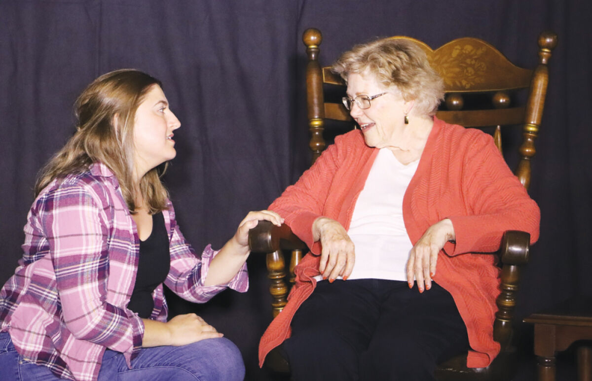  Joanna Delpaz Panagas shares a touching moment with Elizabeth Schaefer in the short play “Go Back Go Back,” by Matthew Moore, of Roseville, part of Grosse Pointe Theatre’s Take Ten: Ten-Minute Play Festival last year. 