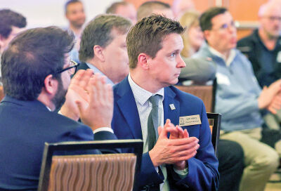  City Council members applaud as the mayor gives his annual State of the City Address on April 17. Pictured, center, is Matt Heintz. 