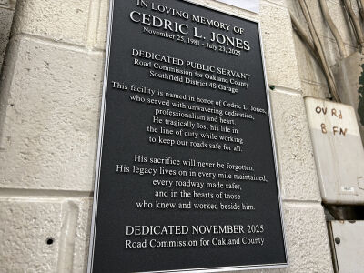  A plaque commemorates Cedric Lanier Jones inside the Road Commission for Oakland County Southfield garage. 