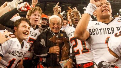  Al Fracassa celebrates at Ford Field after winning the 2013 state championship. It was his final game. 