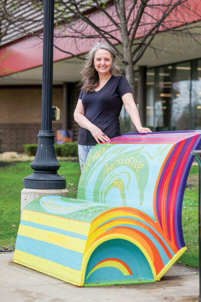  Artist Wendy Popko designed and painted the “Page Turner” bench, which was installed outside the Sterling Heights Public Library in 2025.  