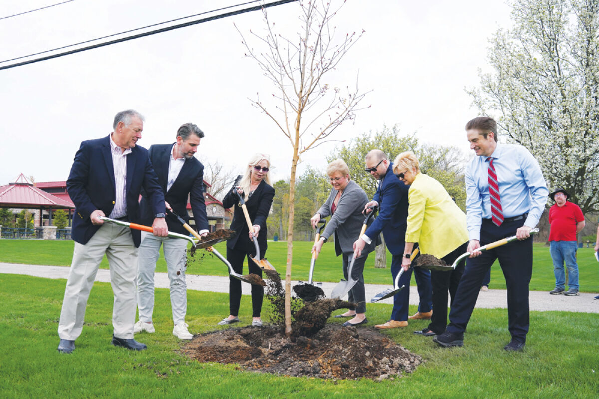  Sterling Heights City Council members marked Arbor Day with a tree planting ceremony April 21 at Dodge Park. Digging in, from left, are Councilman Henry Yanez, Mayor Michael Taylor, Mayor Pro Tem Liz Sierawski, Councilwoman Maria Schmidt, Councilman Michael Radtke, Councilwoman Barbara Ziarko and Councilman Robert Mijac. 