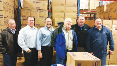  From left to right, Jim Wilhite, Jimmy Binson, Bob Binson, James Binson, Nick Binson and Ken Fasse take a photo to mark the company’s 10-millionth order.  