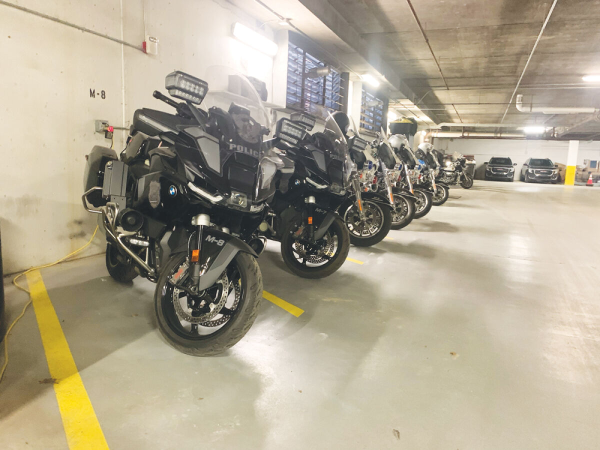  Two new BMW R 1300 RT-P motorcycles are parked in a row of Harley Davidson Electra Glides at the Warren Police Department April 20. The department is working on phasing out the Harley Davidson motorcycles and replacing them with BMWs. 