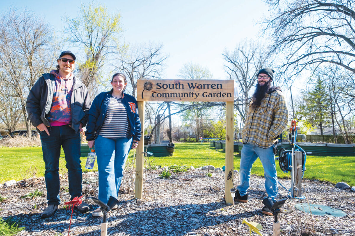  From left, Urban Seed Board Member Jeff Matheus, volunteer Sam Singer and Urban Seed Treasurer and founder John Hofmann pose for a portrait at the South Warren Community Garden on April 20.  