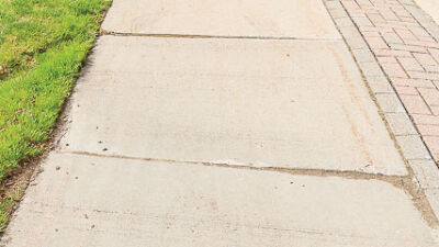  Shores updates sidewalk program policy, relieves property owners of costs 