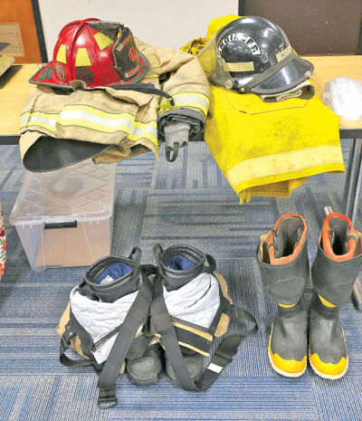  Firefighter turnout gear from the past to the present was on display. 