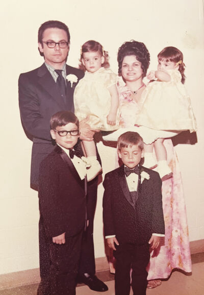  “Imagine having four children in three and a half years, but what a blessing,” said Sara Scrivano, pictured in the early 1970s with her husband  Bob, sons Michael, front row left; David;  and twins Ann and Aileen with bangs.   