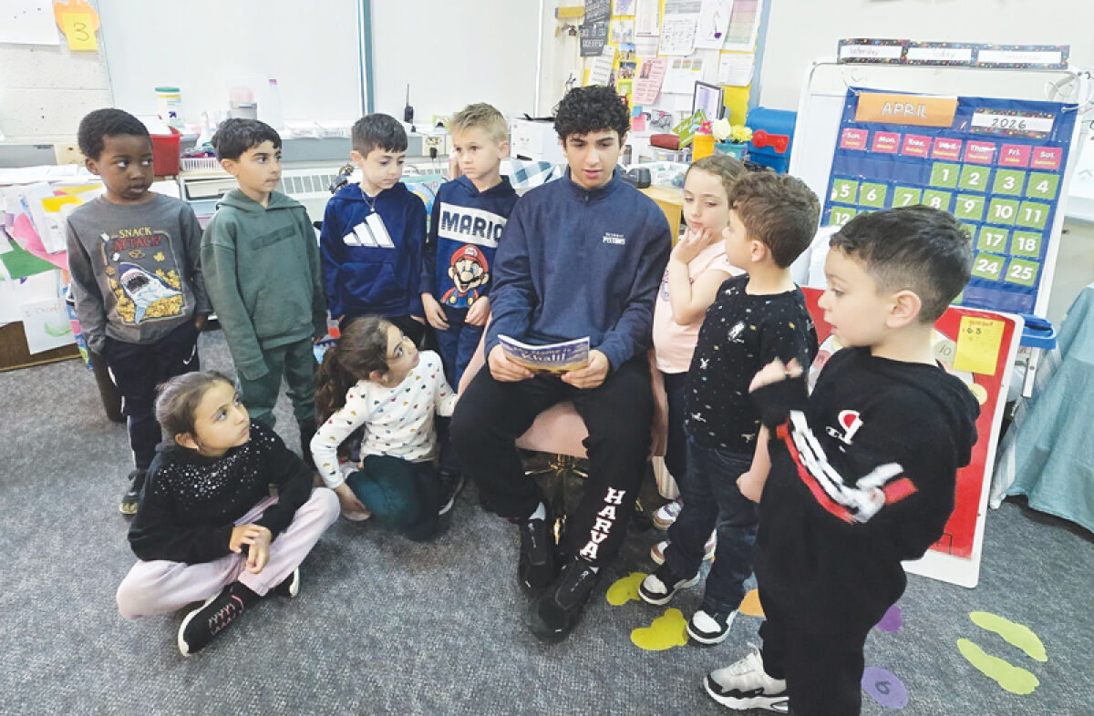  Kalil Wahab reads his book, “My Name is Khalil,” to kids.  