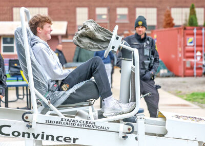  Sophomore Keegan Nichols experiences a simulated 4 mph crash on the seat belt convincer. 