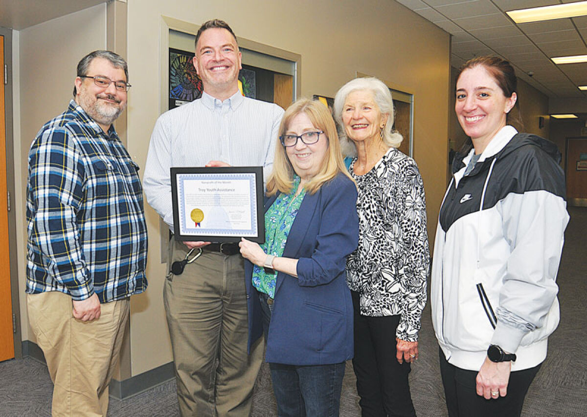  State Rep. Sharon MacDonell, center, presents the Nonprofit of the Month Award to Troy Youth Assistance. With her is Walt Cook, treasurer of TYA, left; Mike Caminidi, TYA caseworker; Aleta Meskon, with the Troy Women’s Association; and Kerry Brennan, assistant principal at Troy High. 