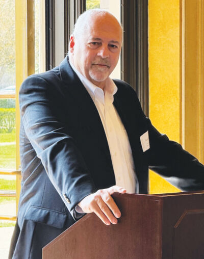  Henry Ford Health President and CEO Robert Riney gives the luncheon’s keynote address. 
